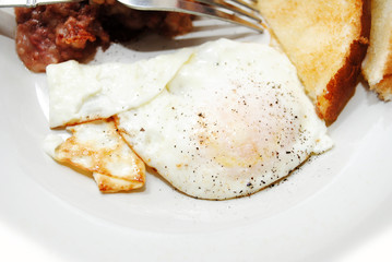 A Peppered Over Easy Fried Egg