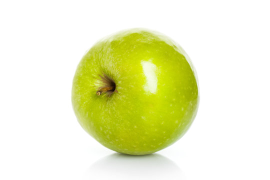 Closeup studio photo of green apple isolated on white
