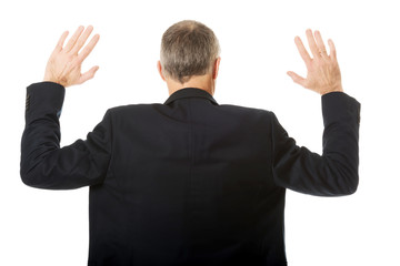 Back view businessman pressing abstract screen