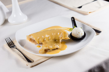 Sauce Covered Dessert Crepes with Ice Cream