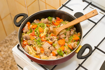 Stew meat in the pan.