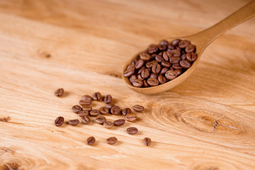 Coffee spoon on wooden background