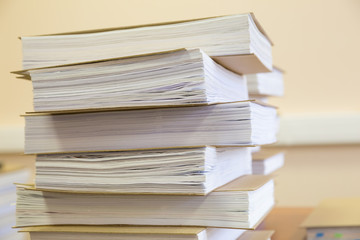 stack of working documents for archive