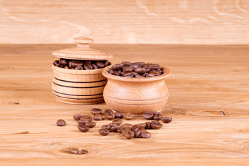 Coffee in a pot on a wooden background