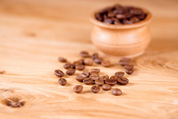 Coffee in a pot on a wooden background