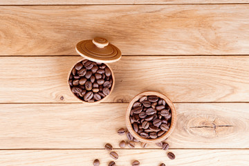 Fototapeta na wymiar Coffee in a pot on a wooden background