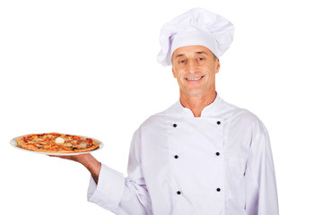 Chef baker with italian pizza