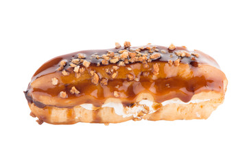 Eclair with caramel decoration