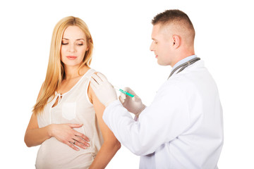 Pregnant woman getting vaccine