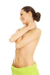 Fototapeta premium Beautiful happy woman wrapped in towel