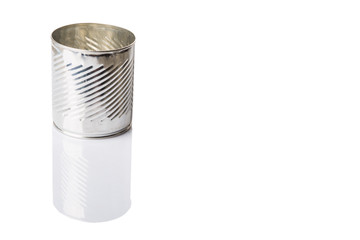 Empty tin can over white background 