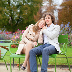 Romantic couple in a park, having a date