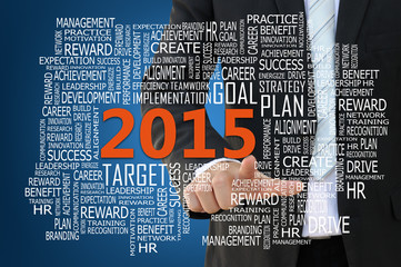 Businessman pointing 2015 business concept