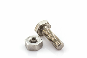Metal screw and nuts on white background.
