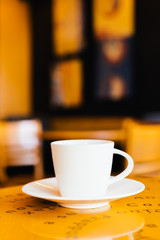 Black coffee in white cup