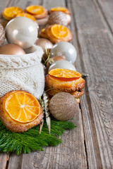 Christmas cookies with tangerine background