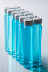 Bottles with blue liquid