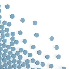 Blue pills background isolated on white