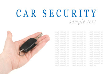 Hand holding car keys isolated on white background
