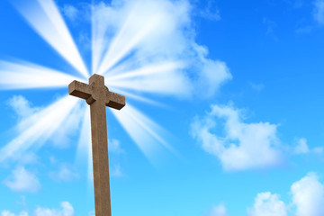 holy cross under a bright sun
