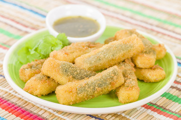 Stuffed Jalapenos - Chilies filled with cheese, breaded & fried