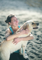 Woman hugging dog. Friendship people and animals.