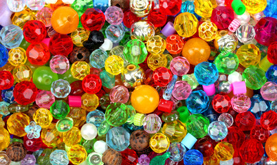 Fototapeta na wymiar close up multi colored beads heap