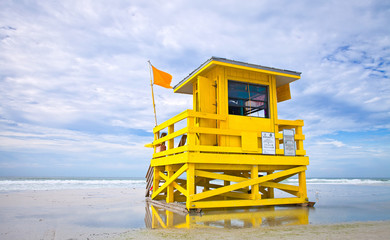 Florida beach yellow lifeguard house , Siesta Key - 75499214