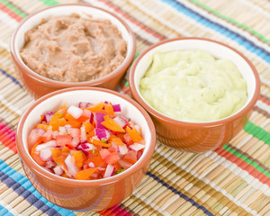 Mexican Dips & Side Dishes - Salsa, Guacamole and Refried Beans.