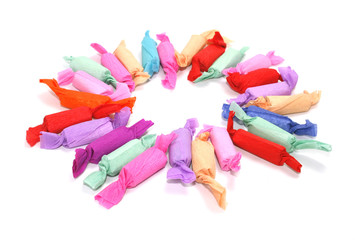 multicolored taffy candy on a white