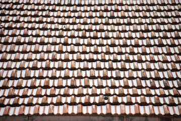 Tiled roof with snow