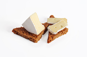 Camembert cheese on a white background