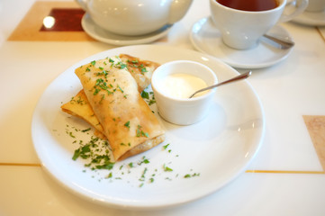 Tasty pancakes on plate in cafe