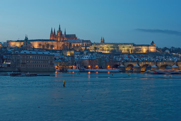 Fototapeta na wymiar Prague Castle with Charles Bridge in the winter