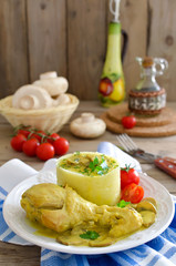 Chicken thighs with mushrooms in a creamy sauce with mashed pota