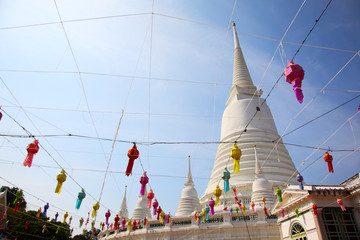 White Pagoda with lantern and ceremonial thread at Wat Prayurawo