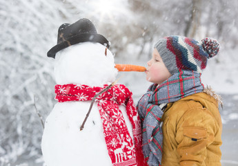 schneemann und kind