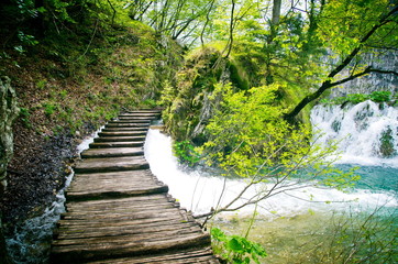 Wooden path and waterfall in Plitvice National Park, Croatia