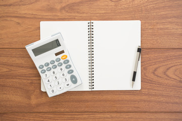 Blank ring binder notebook on wood background