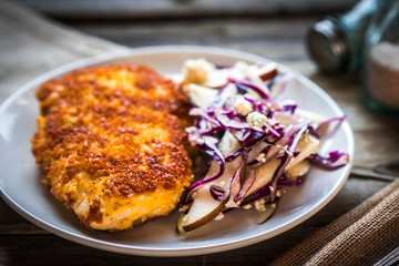 Chicken schnitzel with red cabbage,pears and gorgonzola