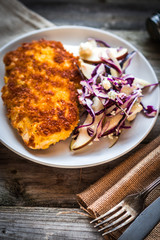 Chicken schnitzel with red cabbage,pears and gorgonzola