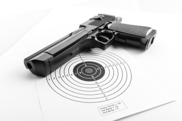 Paper target and pistol