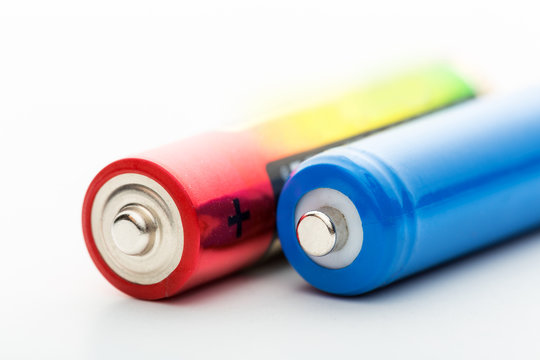 Two batteries on a white background