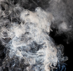 Smoke fragments on a black background