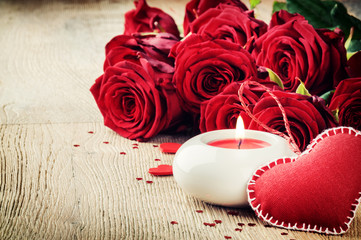 St Valentine's setting with bouquet of red roses