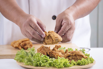 Chef presented Fried chicken, burger and french fries