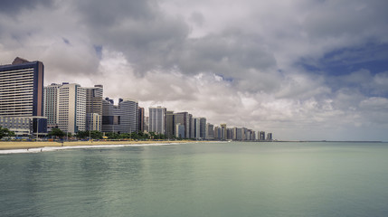 Fototapeta na wymiar Fortaleza Beach with tall buildings in Ceara state, Brazil