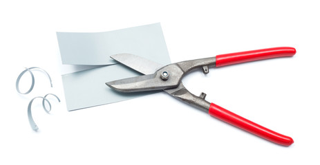 Metallic plate cut with scissors