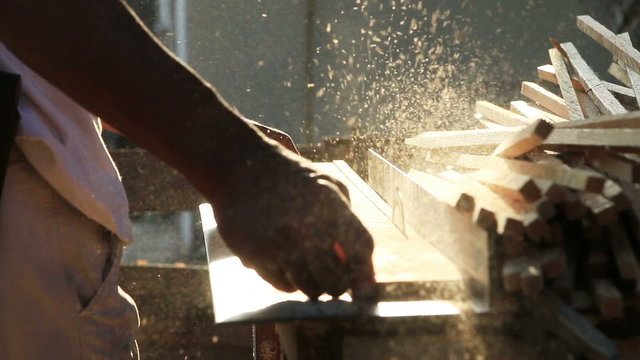 Carpenter use circular table electric saw cutting wood