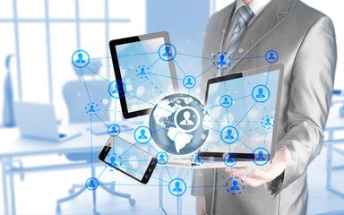 Business man using tablet PC and smartphone social connection